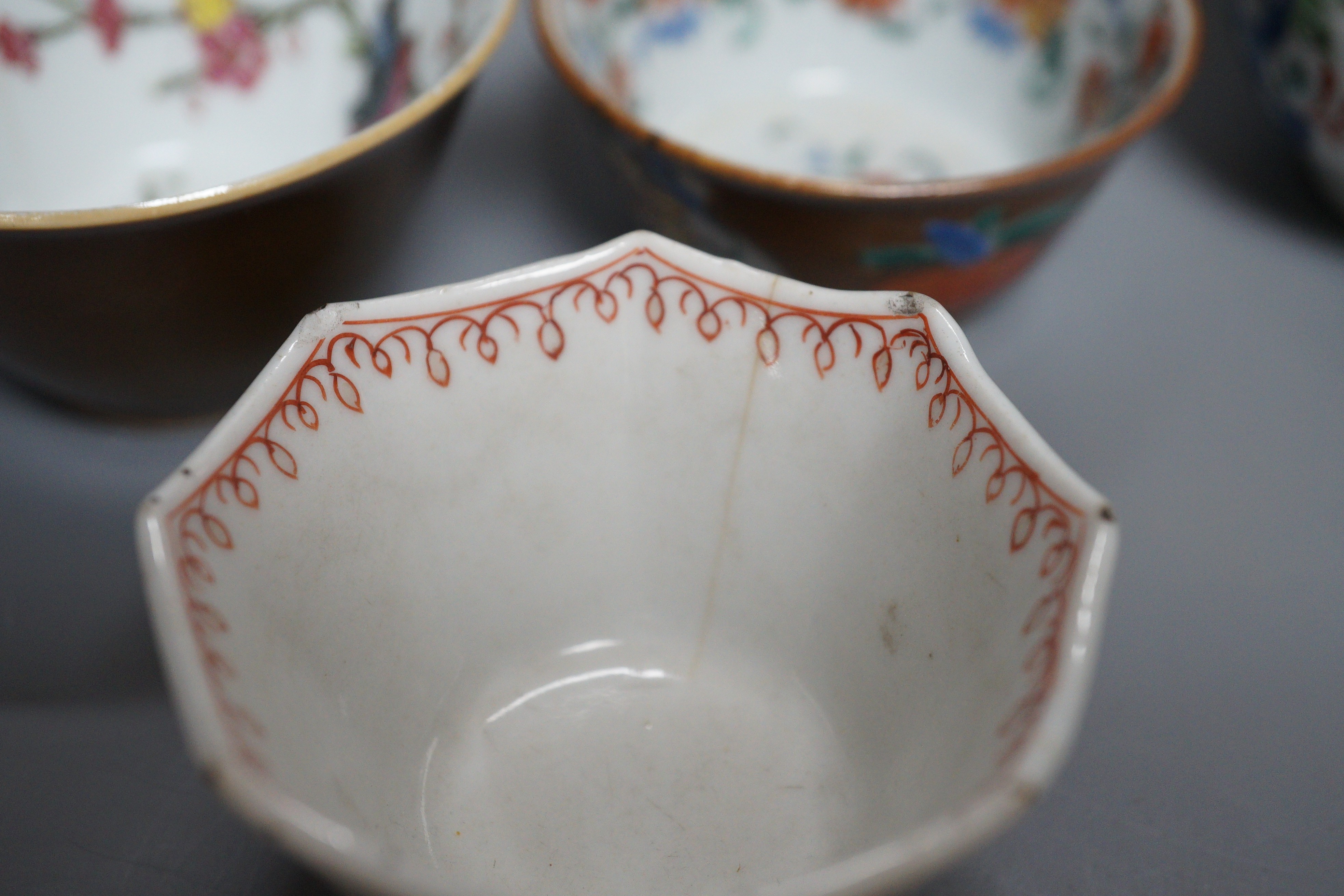 Three Chinese export famille rose cream jugs, one with pierced cover and three small bowls, 18th century and later